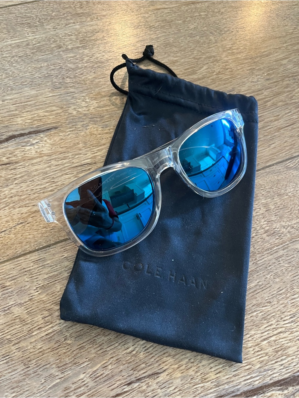 Cole Haan Clear Frame Sunglasses with Blue Mirror Lenses